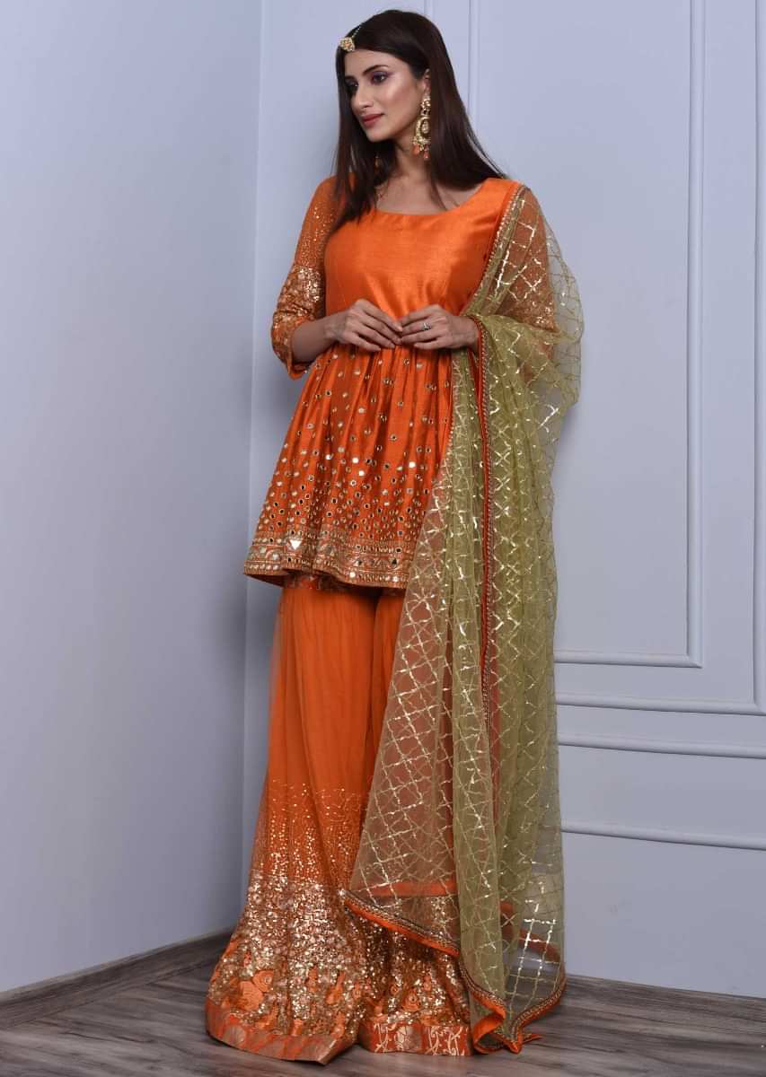 Orange sharara suit set in mirror and zari embroidery only on Kalki