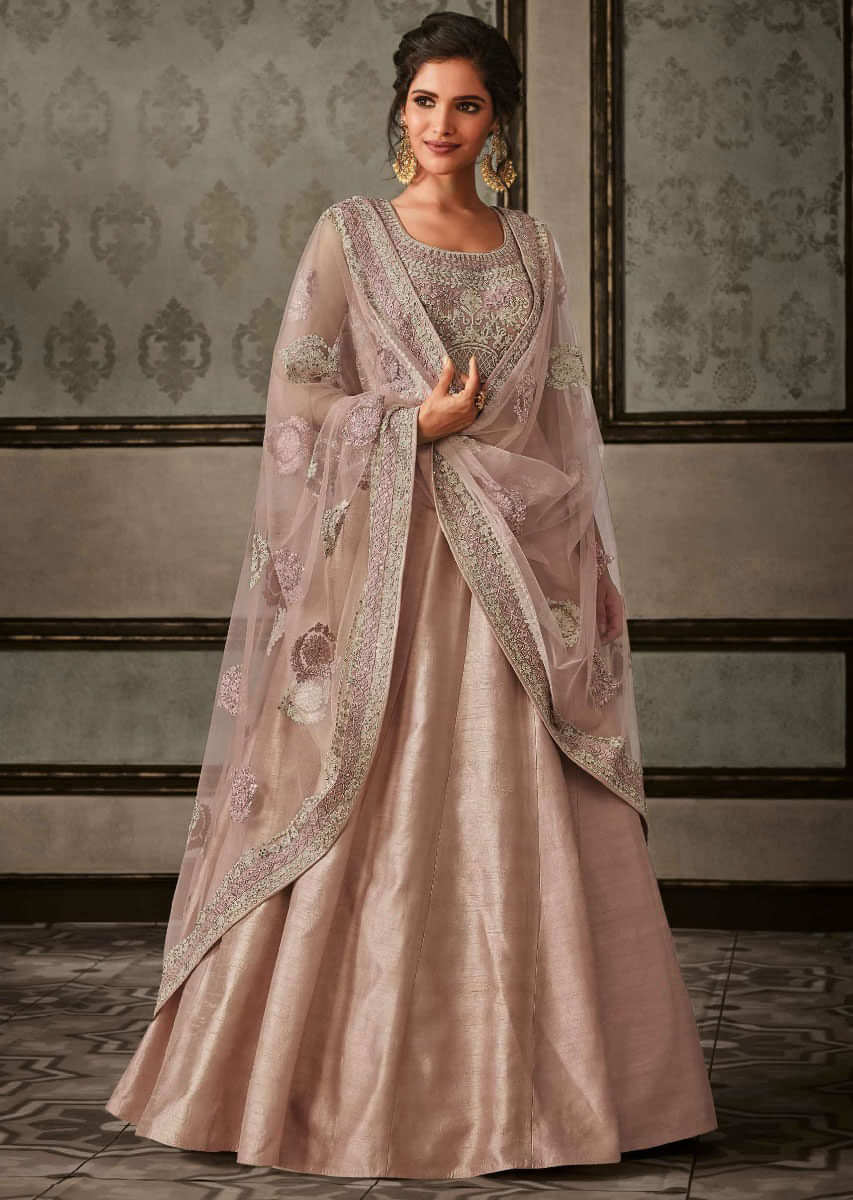 Dull pink anarkali suit featuring in raw silk with code thread embroidery