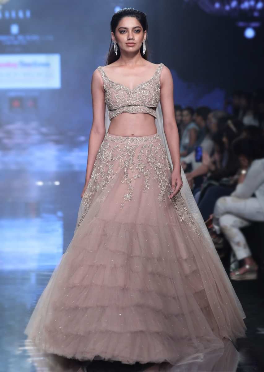 Tejasswi Prakash Shell Champagne Lehenga Choli In Hand Embellished Net With Floral Pattern And Attached Net Cape