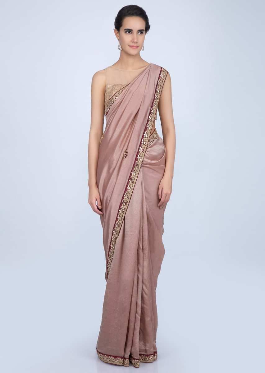 Dusty rose pink tussar silk saree with embroidered butti and border only on Kalki