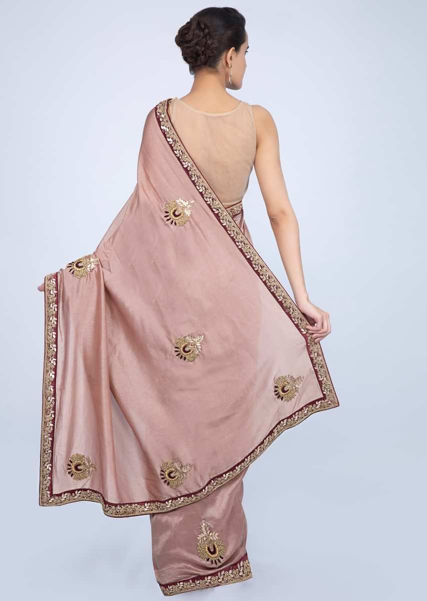 Dusty rose pink tussar silk saree with embroidered butti and border only on Kalki