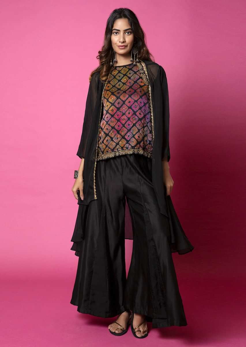 Ebony Black Top With Water Color Effect Bandhani Paired With Paneled Sharara Pants And Jacket  