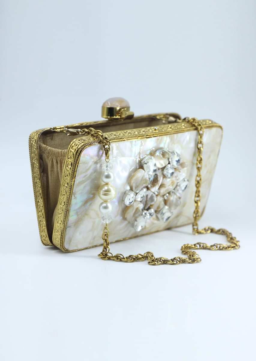 Elegant metallic clutch adorn with mother of pearls, crystal and stones 