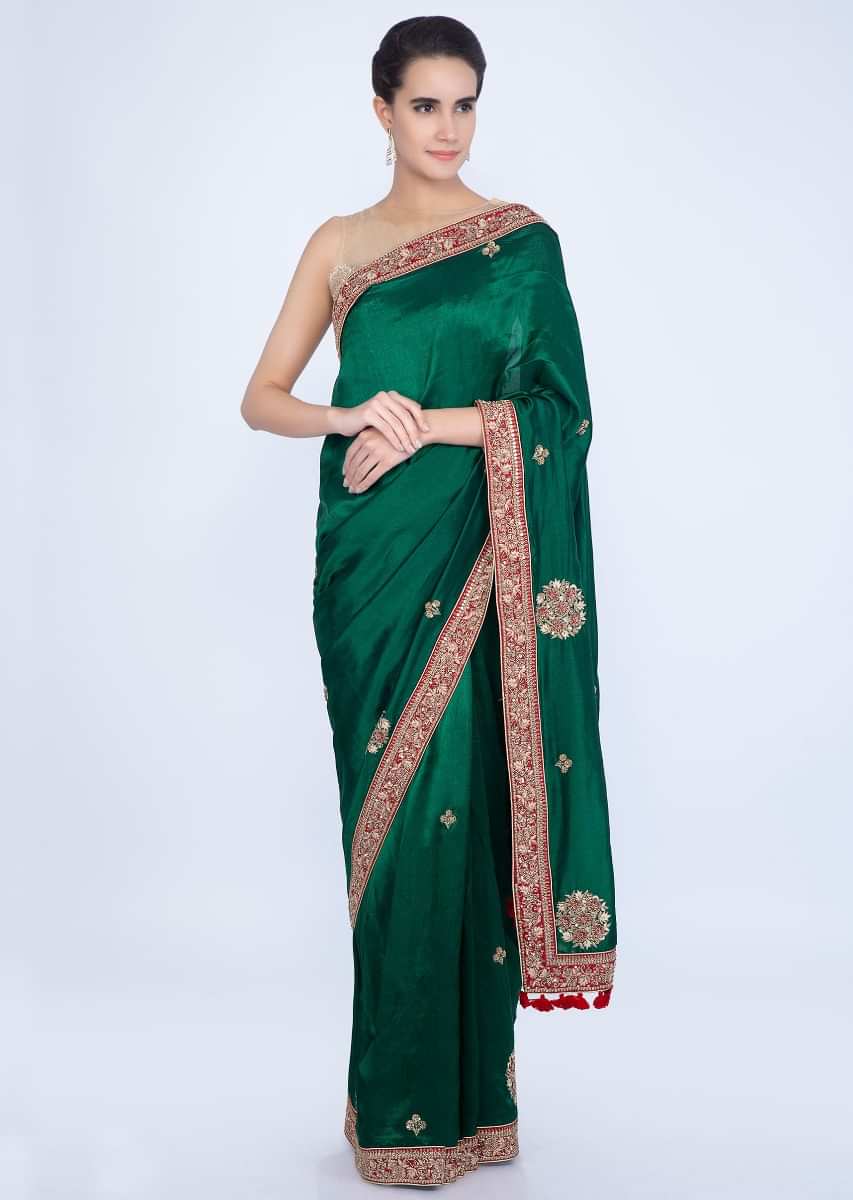 Emerald green silk saree with embroidered butti and border only on Kalki
