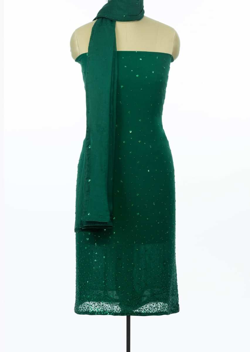 Emerald green unstitched suit set with scattered sequins and motionly on Kalki