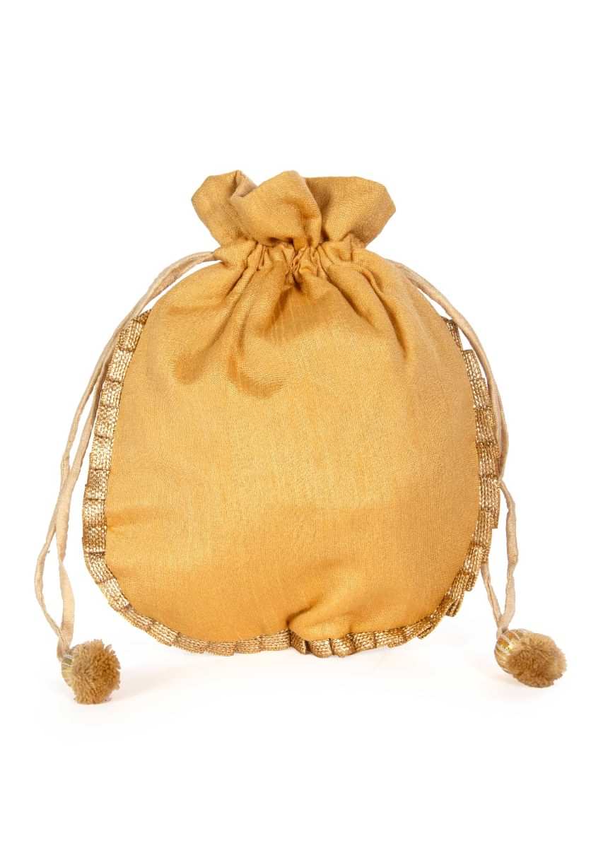 Ethnic beige potli bag embellished with zardosi and sequins embroidery only on kalki