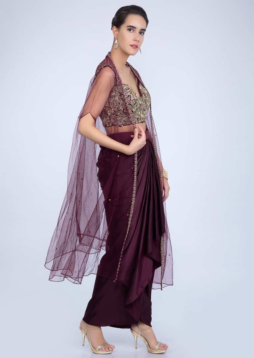 Mahogany Skirt With Fancy Drape And Heavily Embellished Crop Top With Matching Net Dupatta Online - Kalki Fashion