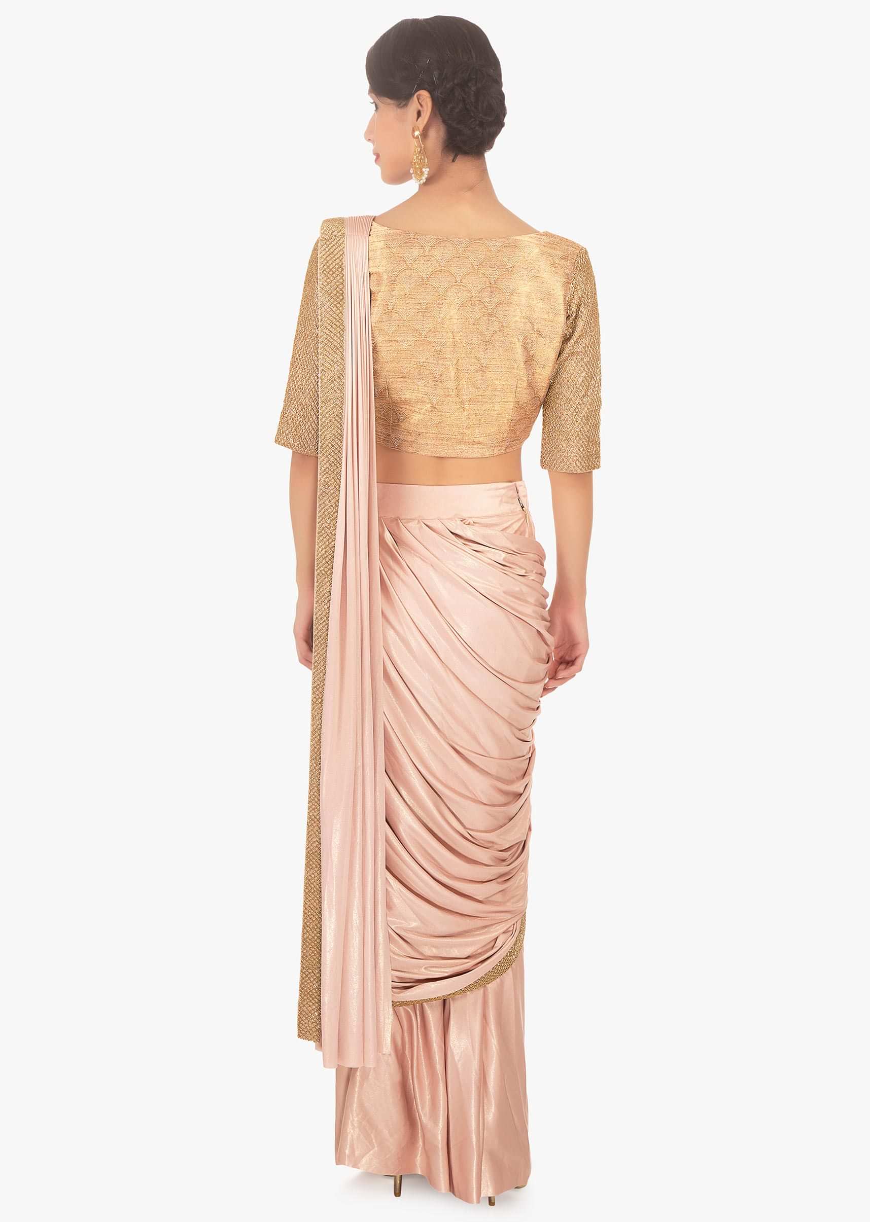 Fancy fabric peach blouse with lycra saree skirt in ready plated pre stitched pallo