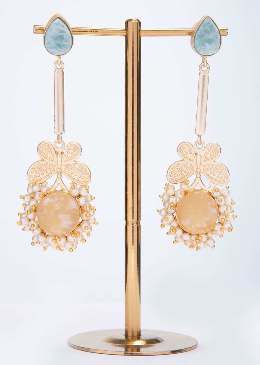 Fancy party wear earring with  moti and semi precious stone  only on kalki