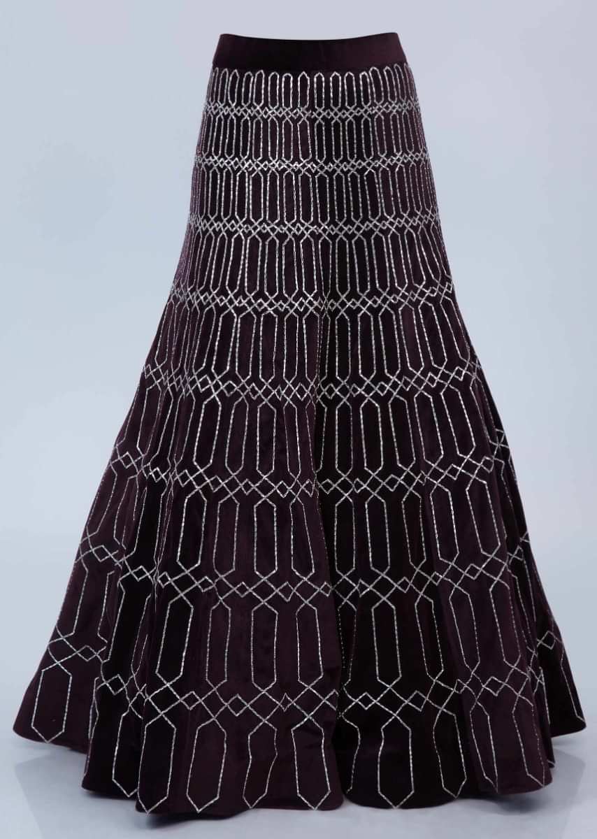 Fancy Velvet Blouse With Ruffled Panel Sleeves Paired With Shaded Plum Velvet Lehenga Online - Kalki Fashion