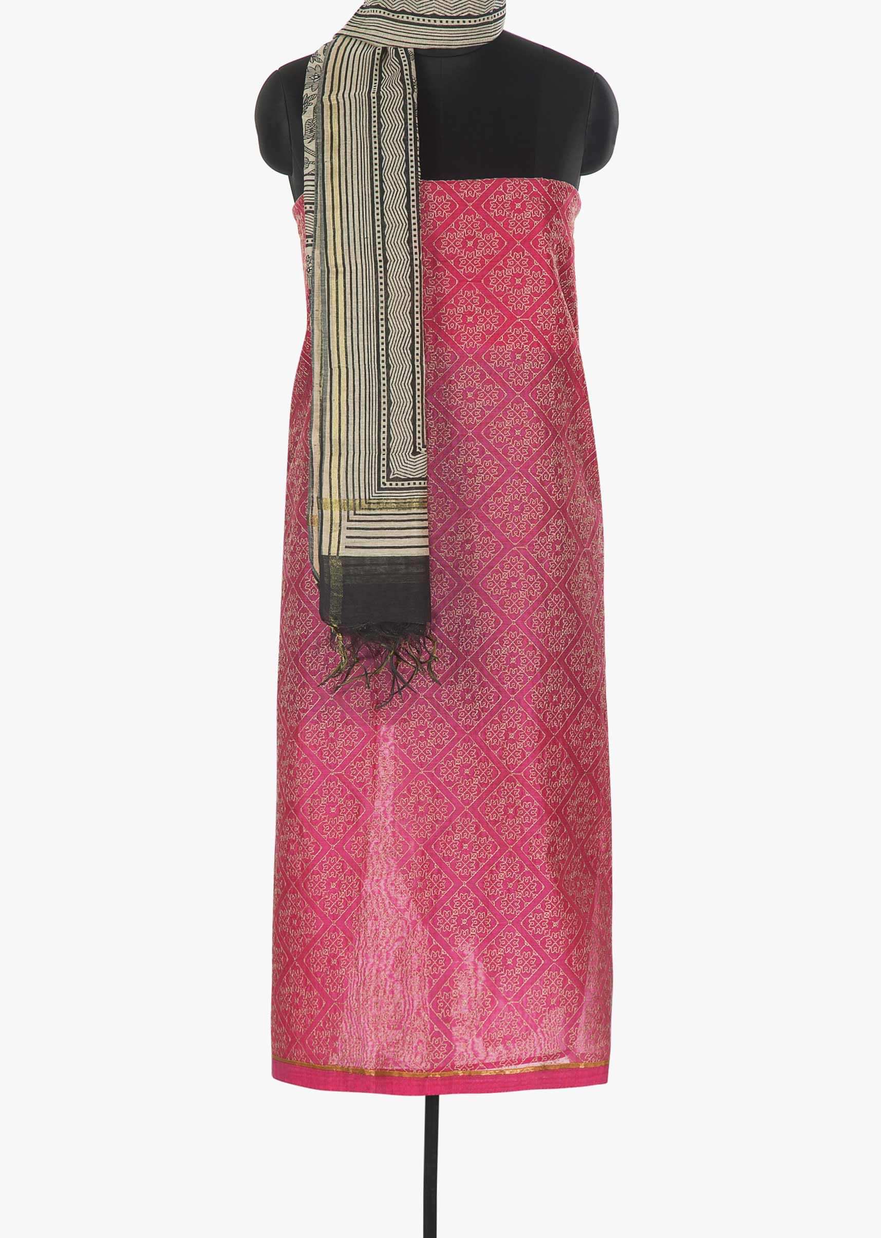 Featuring pink cotton suit enhanced with thread work in rhombus motifs only on Kalki