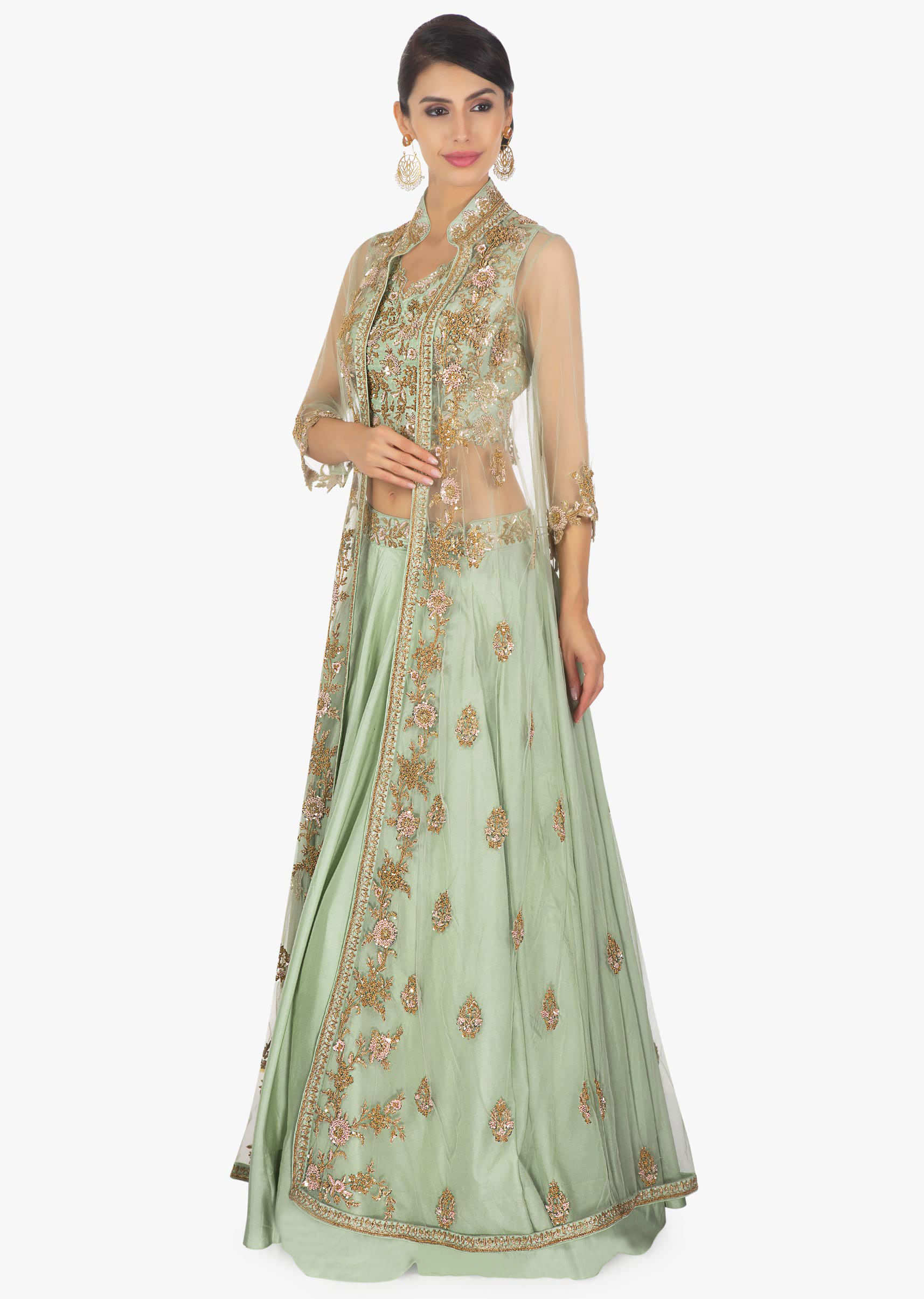 Fern green cotton silk lehenga  paired with a matching blouse and an additional net jacket