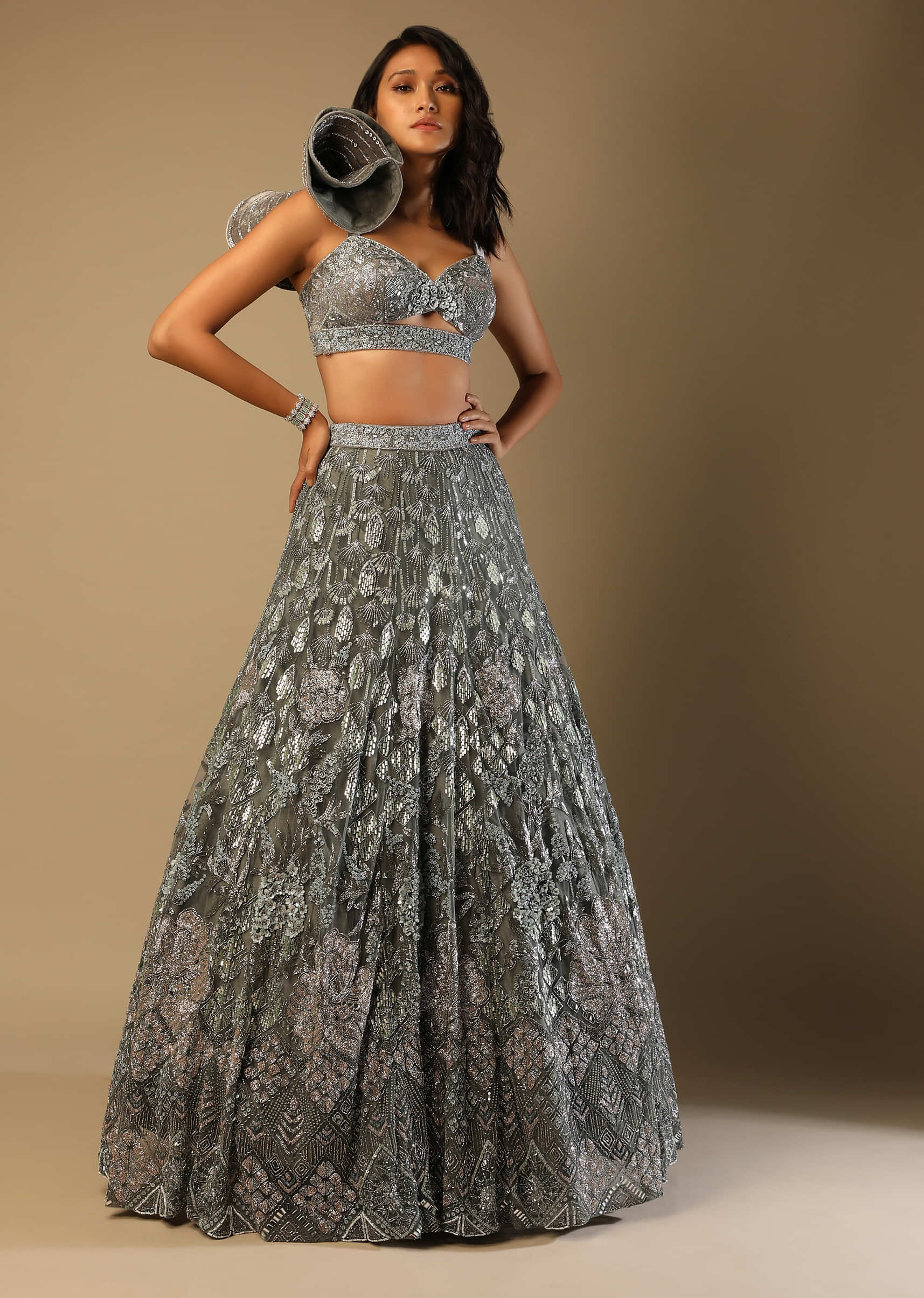 Fern Green Lehenga Choli In Net With Stone Hand Embroidered Floral Motifs And Fancy Origami Cones On The Shoulder 
