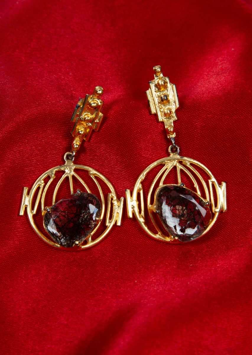 Filigree style metal earring adorn with semi precious stone only on Kalki