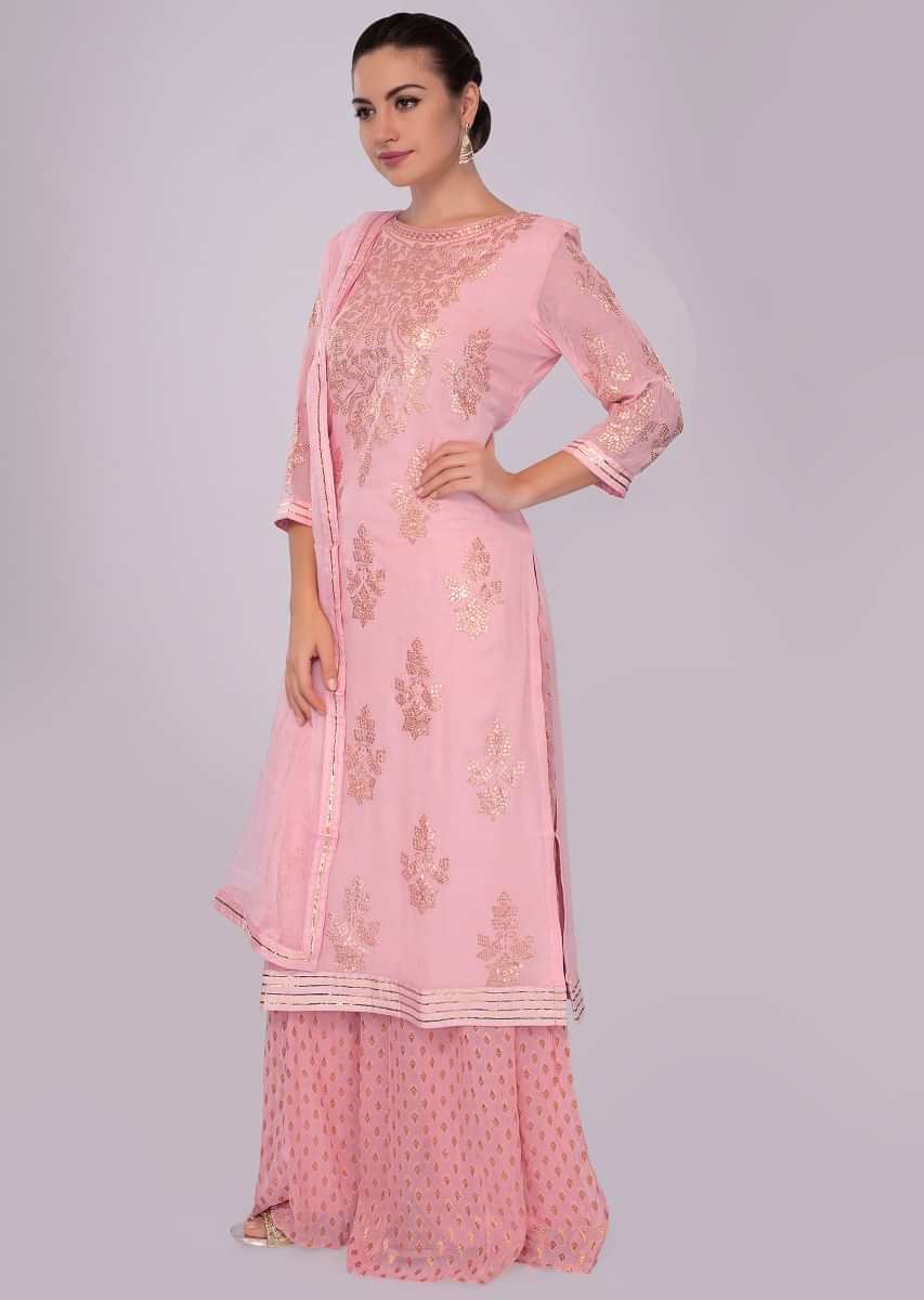 Flamingo pink georgette palazzo suit set in zari embroidery and butti 