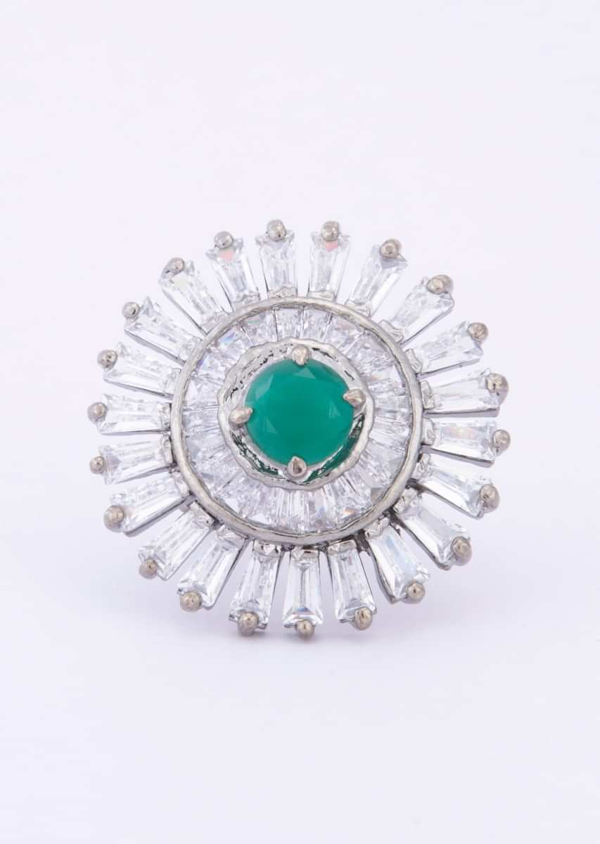 Floral shape ring adorn with buggle beads and emerald green stone only on Kalki