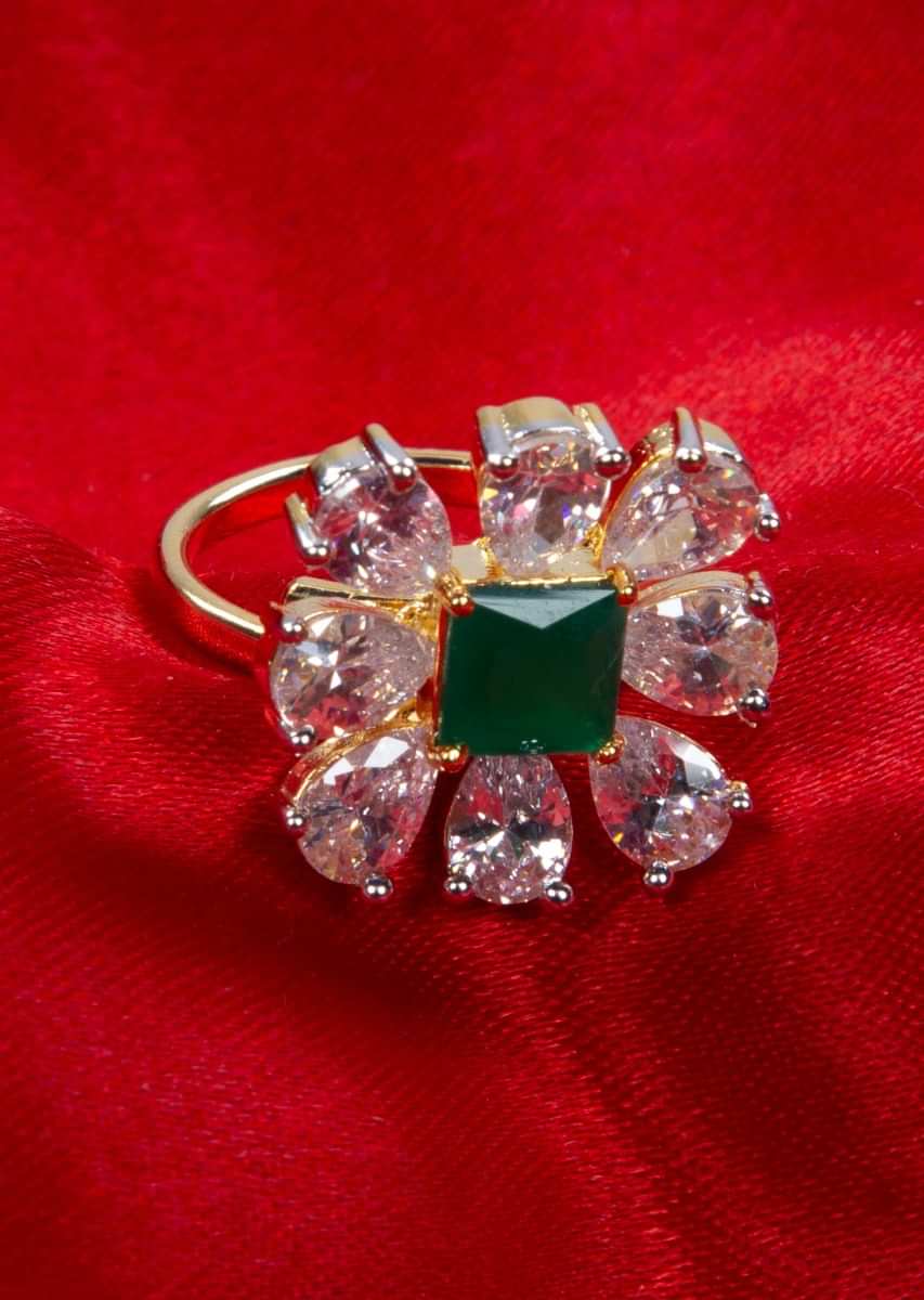 Floral shape ring with pearl cut diamond and emerald green princess cut stone only on kalki