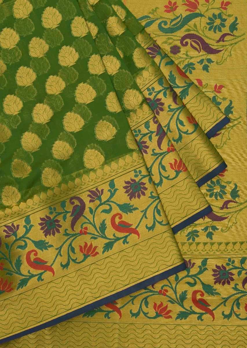 Forest green saree in silk with weaved butti and floral jaal at pallav border only on Kalki