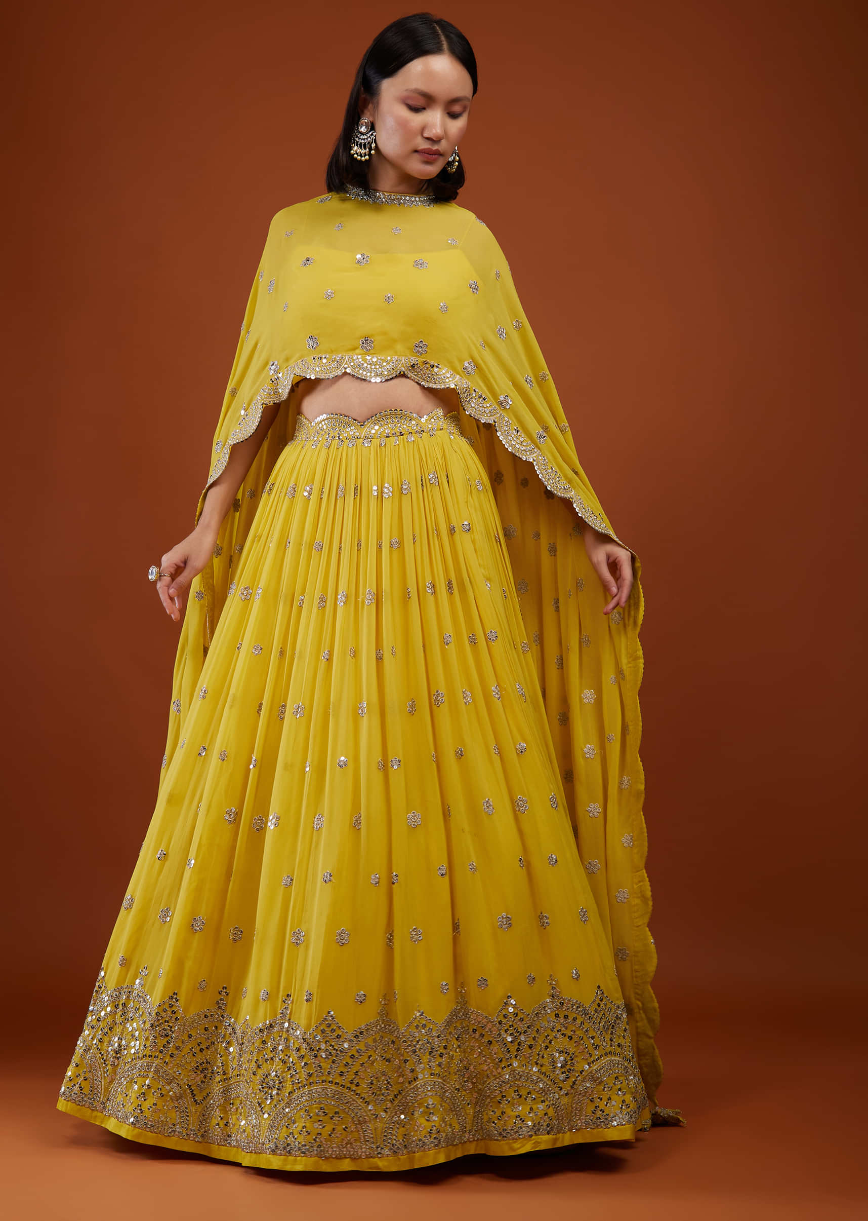 Daffodil Yellow Embroidered Lehenga In Georgette With Cape