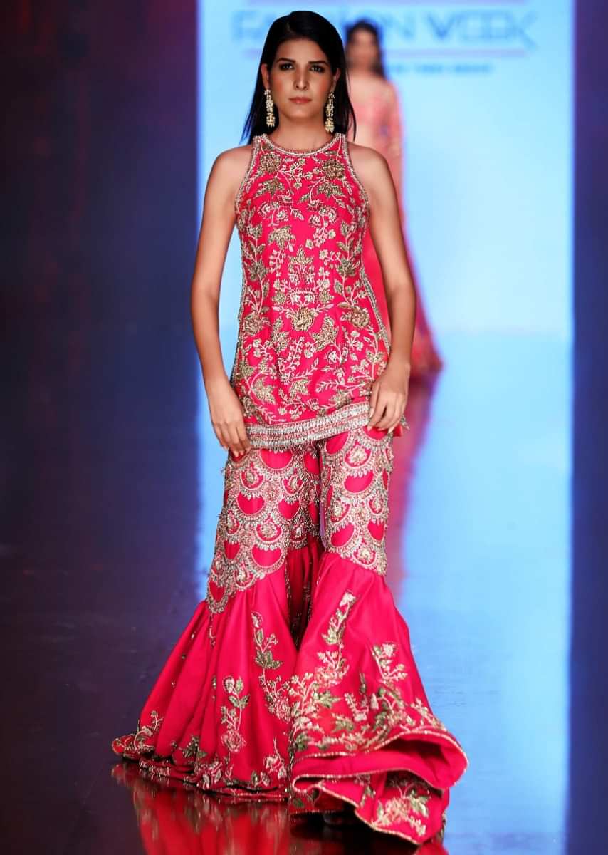 French Pink Suit With Halter Neck And Embroidery Having Long Trail Sharara Online - Kalki Fashion
