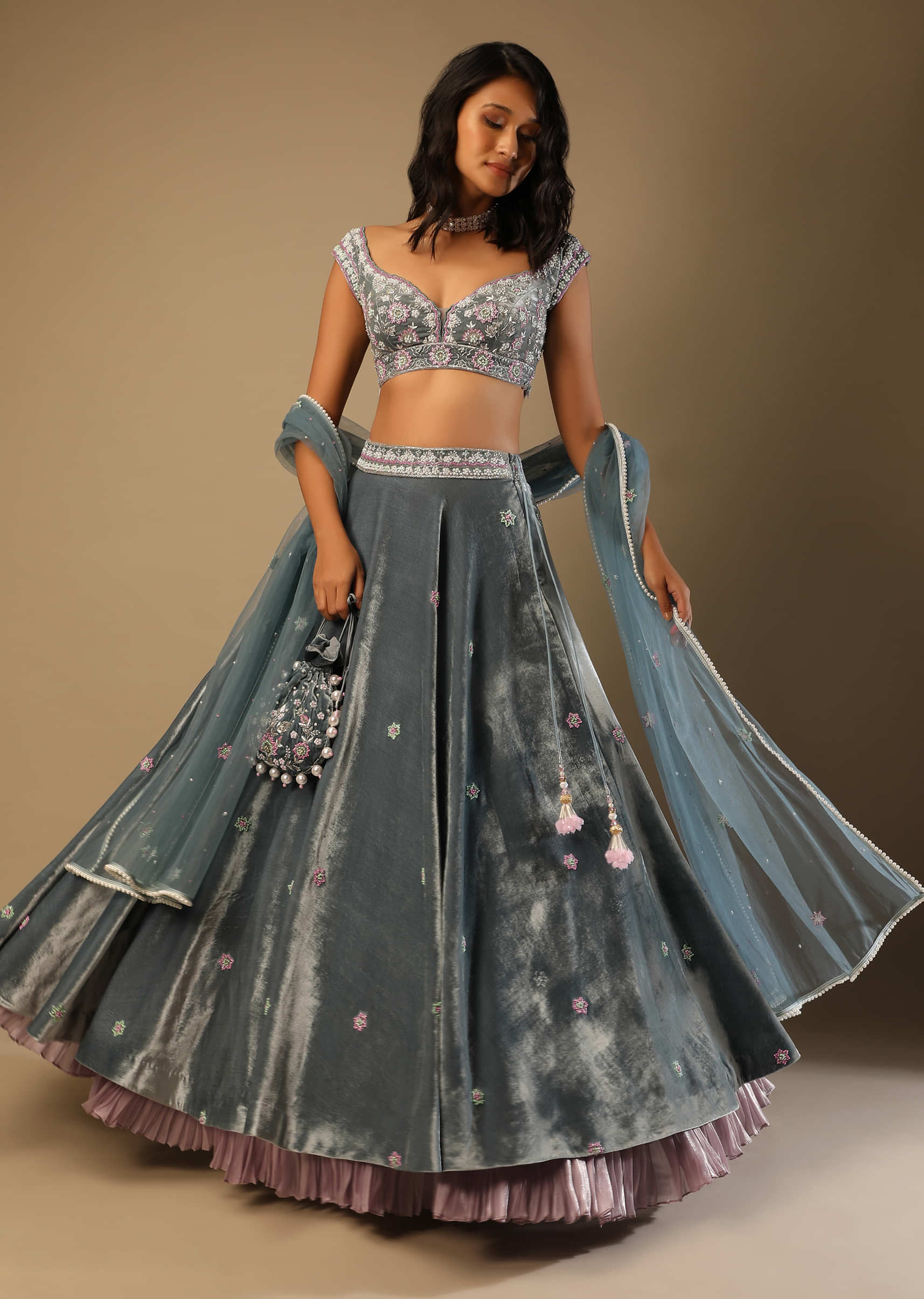 Frozen Blue Lehenga With Multi Colored Hand Embroidered Floral Buttis And Heavy Embroidered Choli 