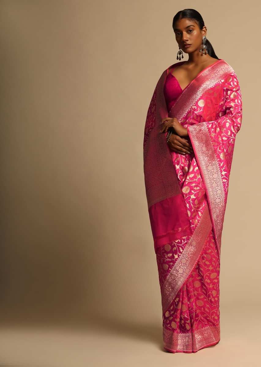 Fuchsia Pink Banarasi Saree In Pure Handloom Silk With Woven Floral Jaal And Floral Border Along With Unstitched Blouse Piece  