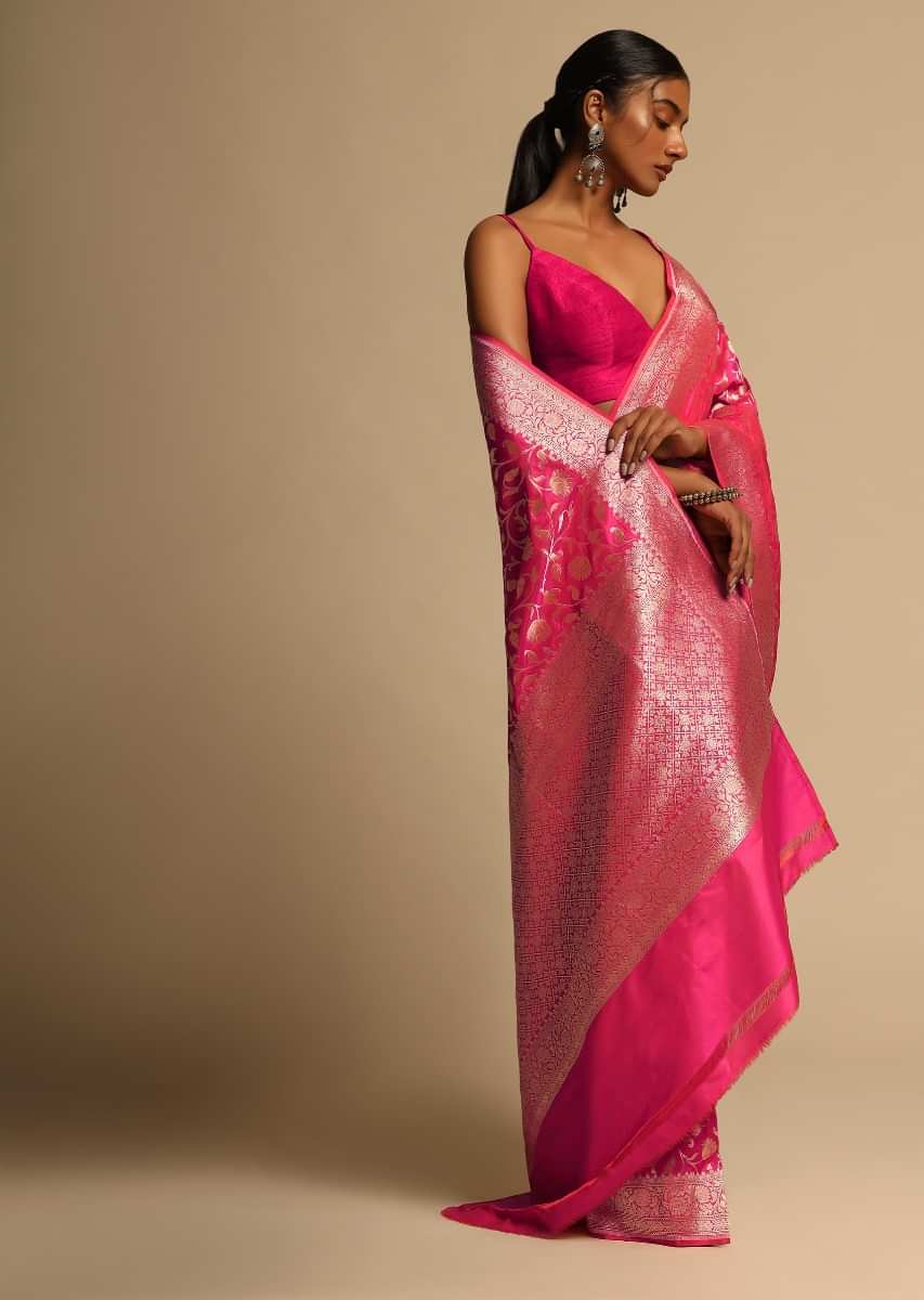 Fuchsia Pink Banarasi Saree In Pure Handloom Silk With Woven Floral Jaal And Floral Border Along With Unstitched Blouse Piece  