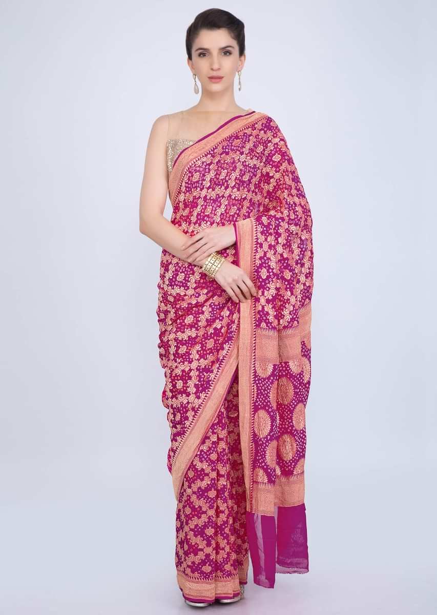 Fuchsia pink georgette saree with weaved jaal work  and bandhani print only on kalki