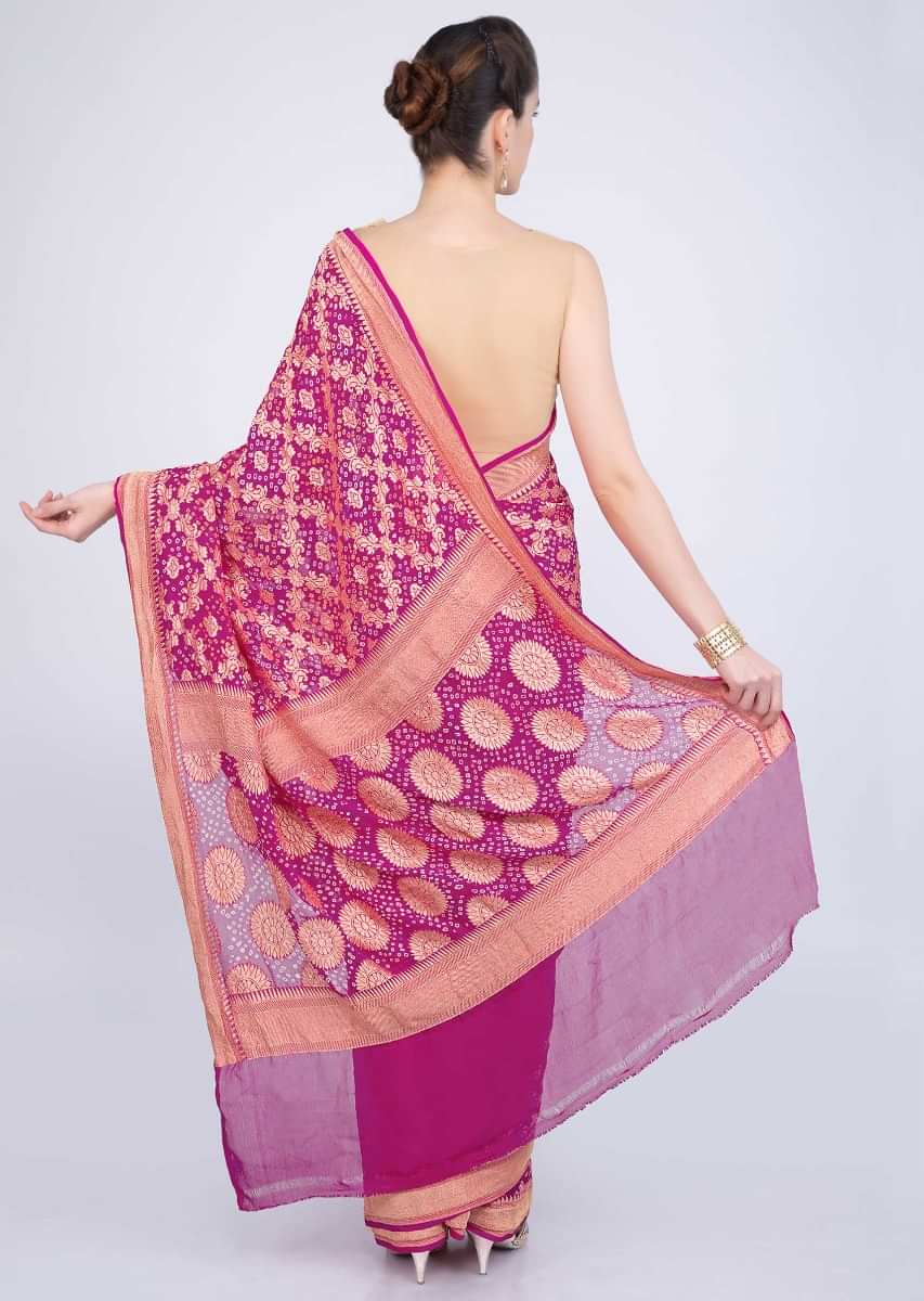 Fuchsia pink georgette saree with weaved jaal work  and bandhani print only on kalki