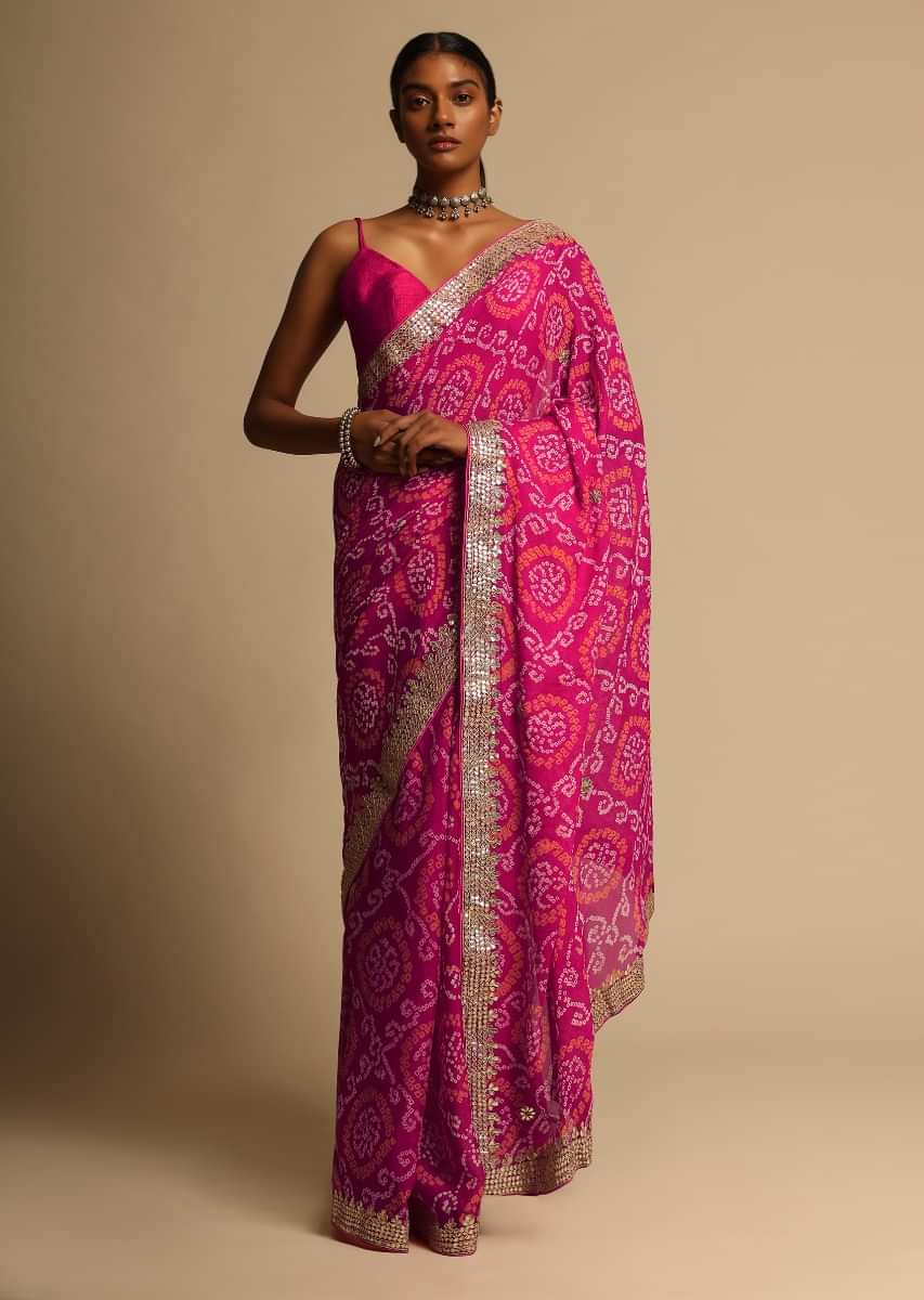 Fuchsia Pink Saree In Georgette With Bandhani Jaal All Over And Gotta Embroidered Border Along With Unstitched Blouse  