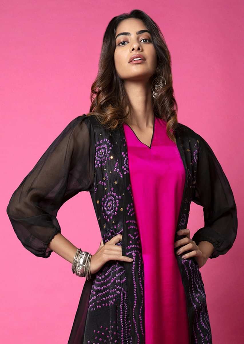 Fuchsia pink Tunic with contrast piping layered with a ebony black ...