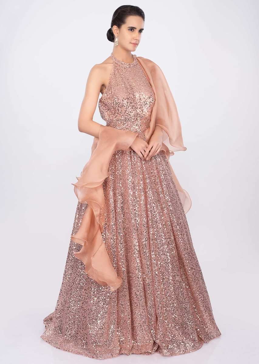 Giorgia Andriani in kalki peach halter neck sequins embroidered gown with ruffled side drape