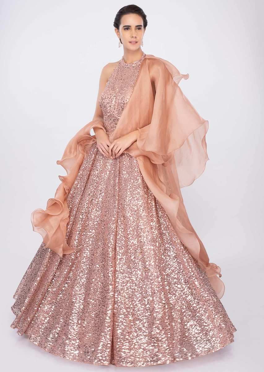 Giorgia Andriani in kalki peach halter neck sequins embroidered gown with ruffled side drape