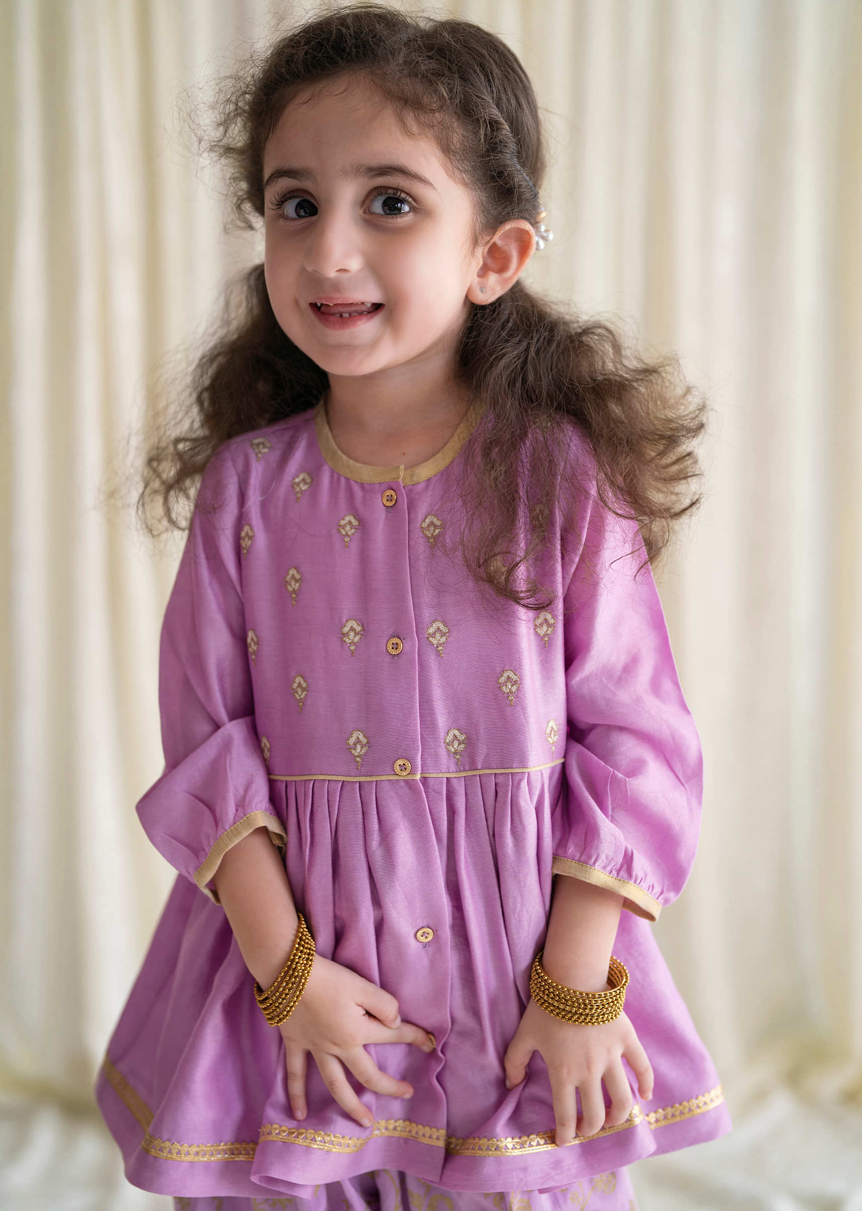 Kalki Girls Combo Of Lilac Purple Embroidered Angrakha Set And Gold Printed Bow Hairclip
