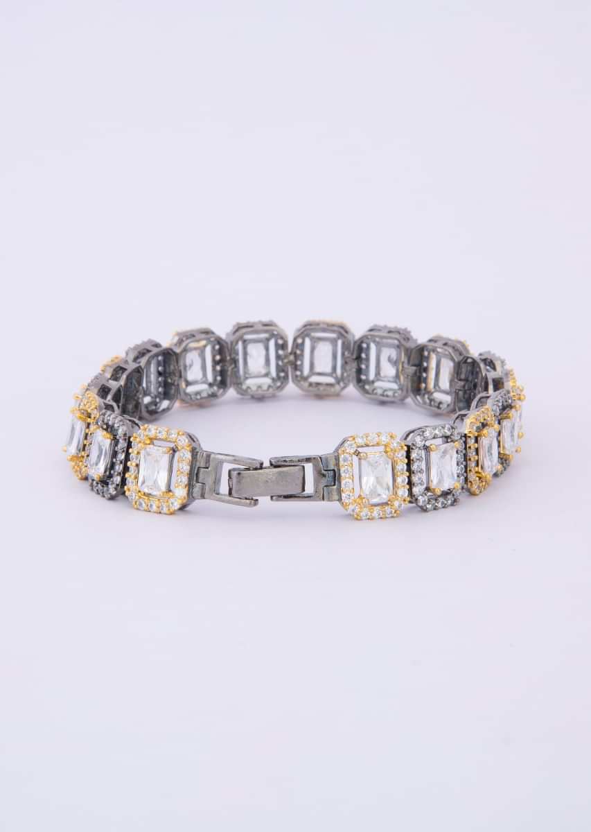 Gold and silver stone studded bracelet with crystal stone  only on Kalki