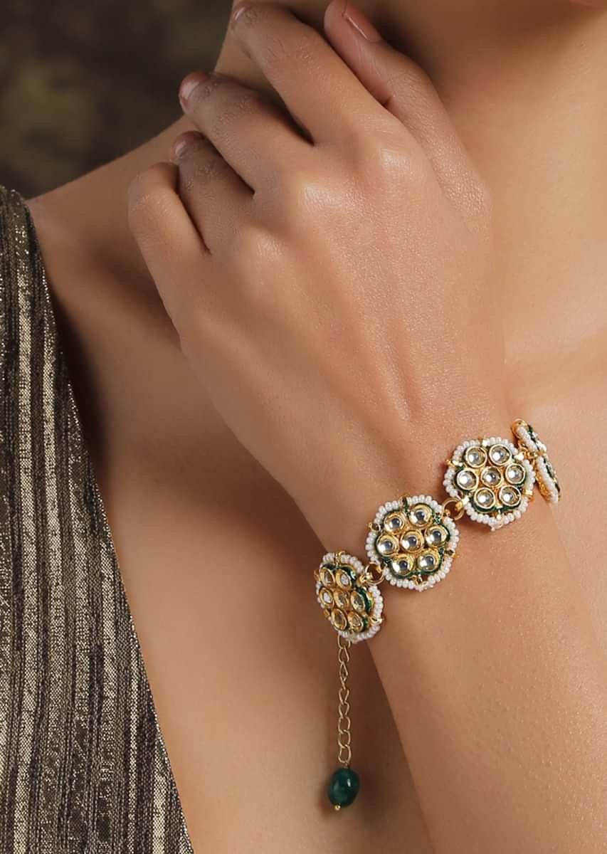 Gold And White Bracelet With Kundan And Shell Pearls Assembled In Floral Motifs By Paisley Pop