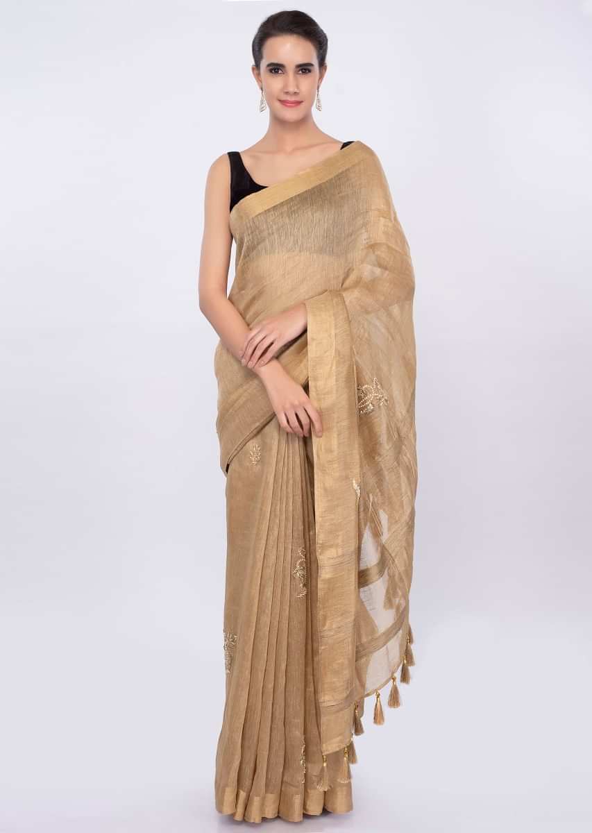 Gold linen saree with embroidered butti only on Kalki