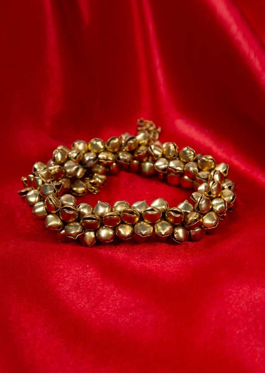 Gold plated bracelet heavily embellished  with ghungru only on Kalki
