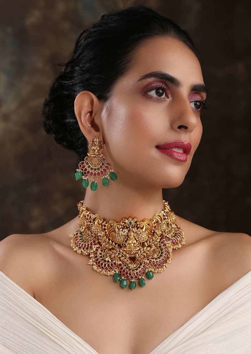 Gold Plated Choker Necklace Set Featuring Authentic Temple Work Studded With Red Stones And Dangling Green Beads By Paisley Pop