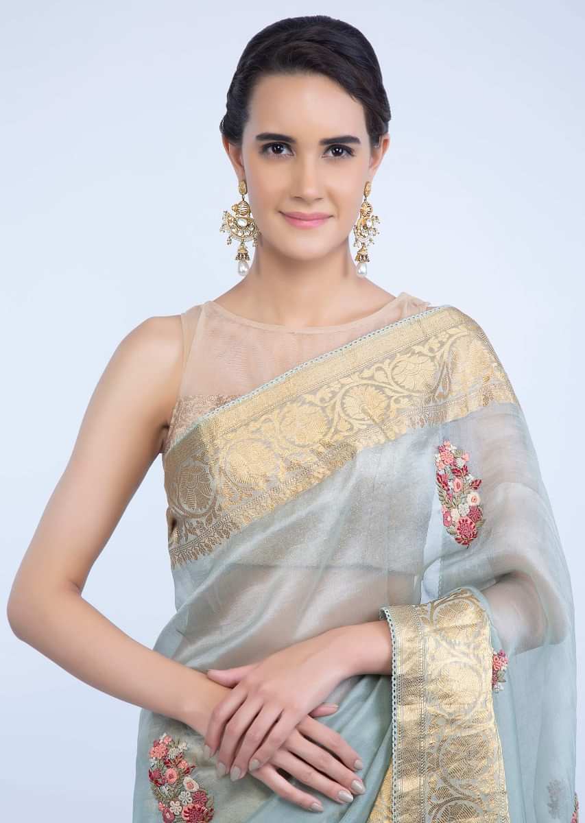 Gold plated fancy traditional earring adorn with kundan,moti stone and pearls only on Kalki