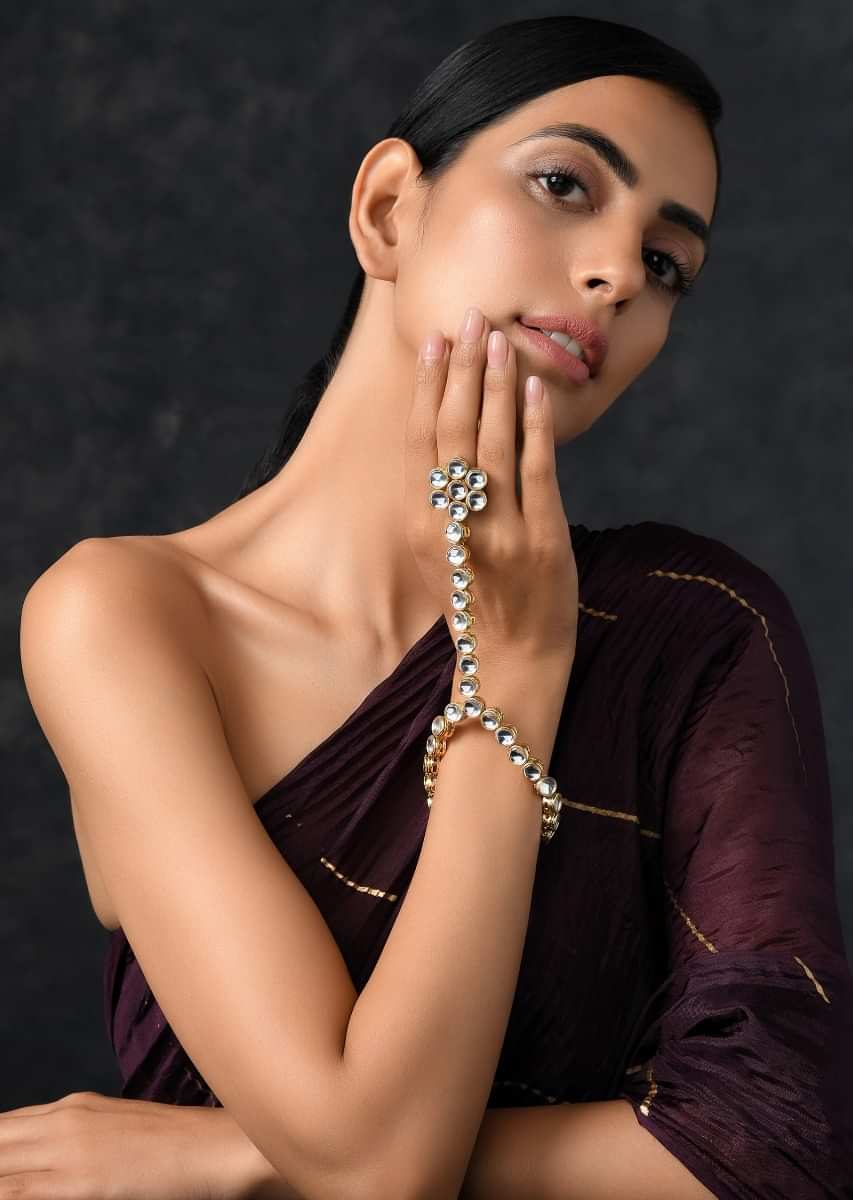 Gold Plated Hand Harness With Beautifully Handcrafted Floral Design Adorned In Kundan Work By Paisley Pop