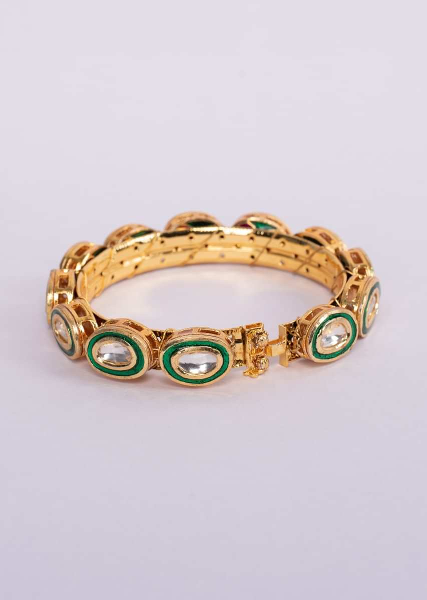 Gold plated kada with kundan and emerald green stone  only on Kalki