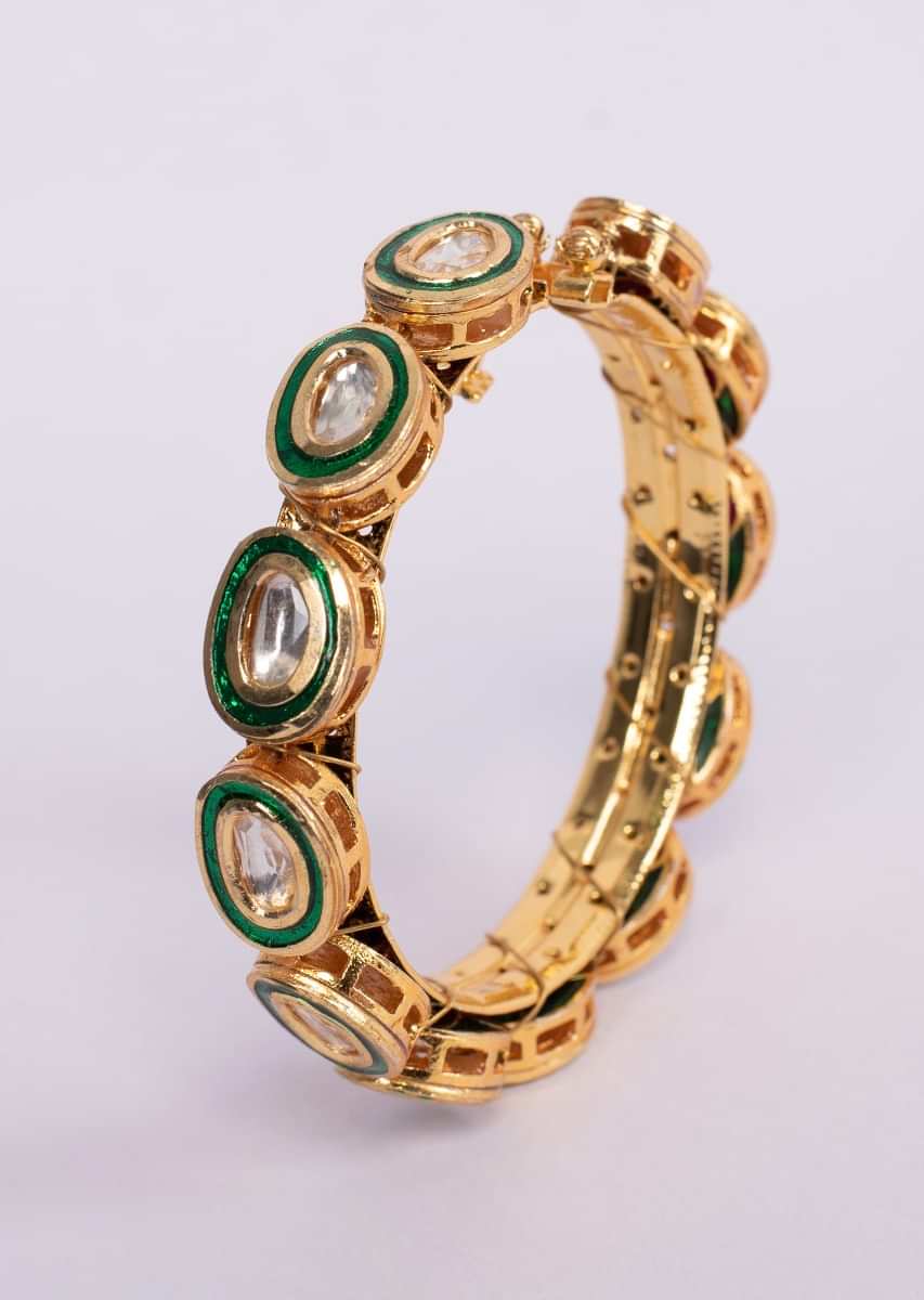 Gold plated kada with kundan and emerald green stone  only on Kalki