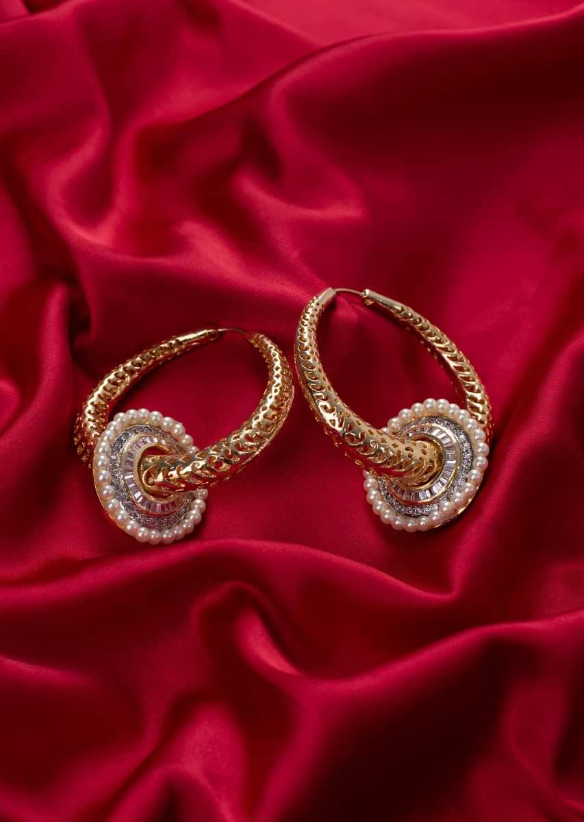 Gold plated metal hoop with cut outs only on Kalki