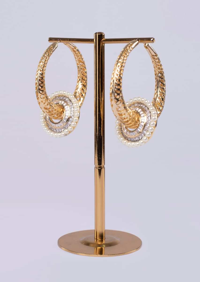 Gold plated metal hoop with cut outs only on Kalki