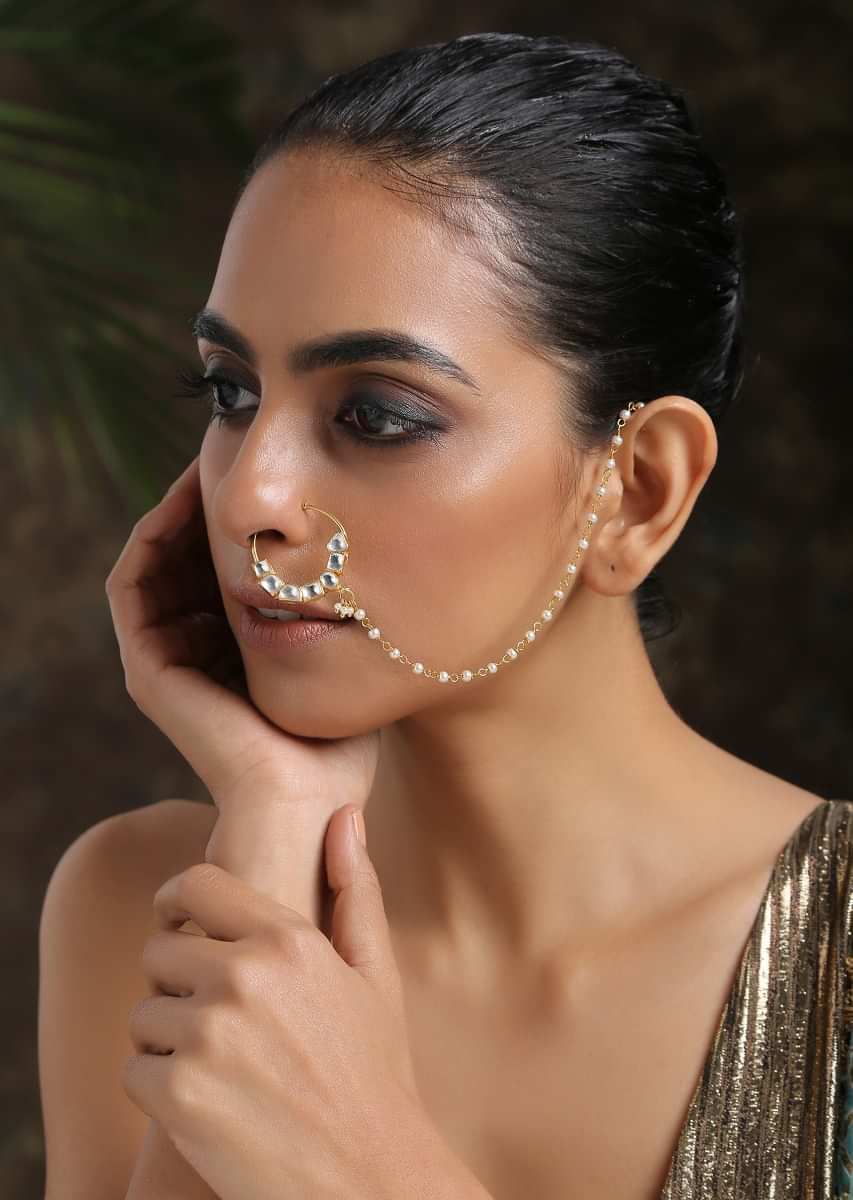 Gold Plated Nose Ring Intricately Put Together With Fascinating Shapes Of Kundan And Shell Pearl Detailing By Paisley Pop