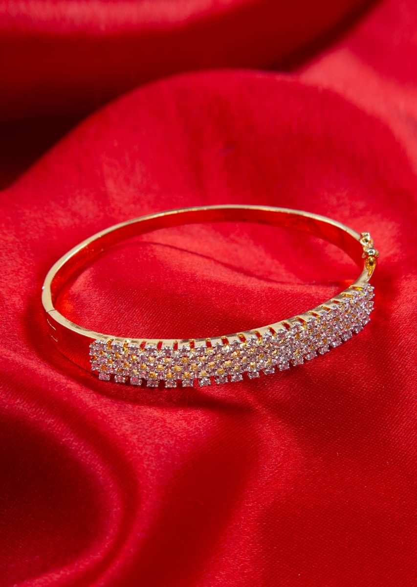 Gold plated ring heavily embellished with diamond stone only on kalki