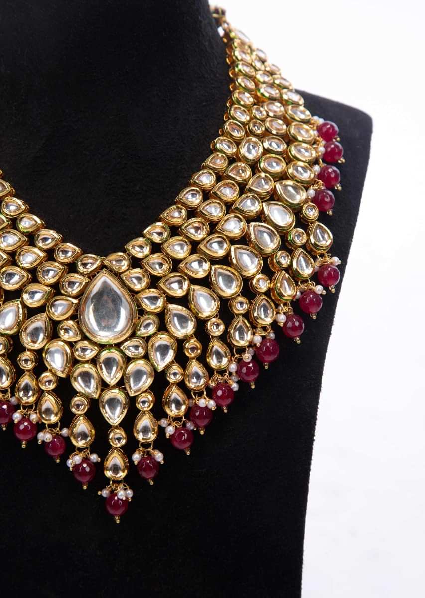Gold plated traditional kundan necklace with magenta and off white beads only on Kalki