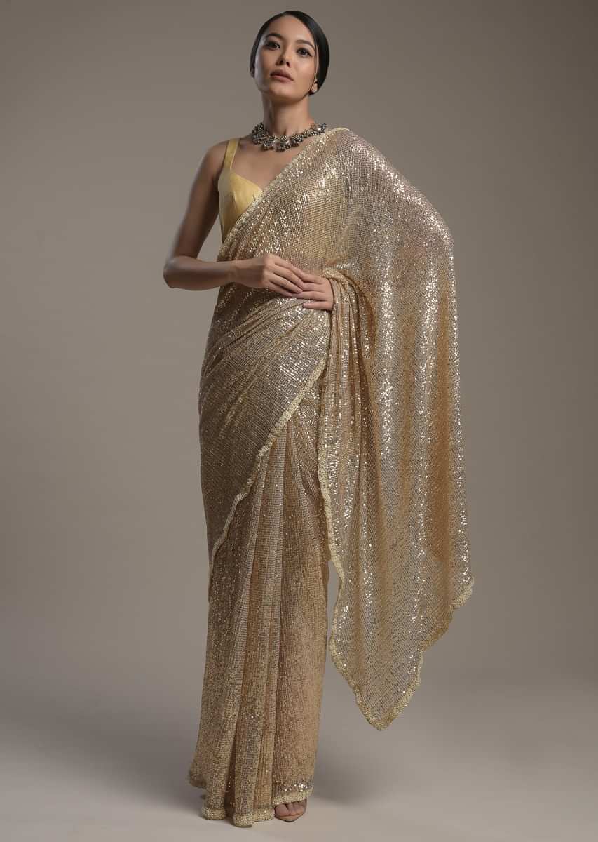 Gold Saree Embellished In Sequins With Moti Embroidered Border And Unstitched Blouse Online - Kalki Fashion