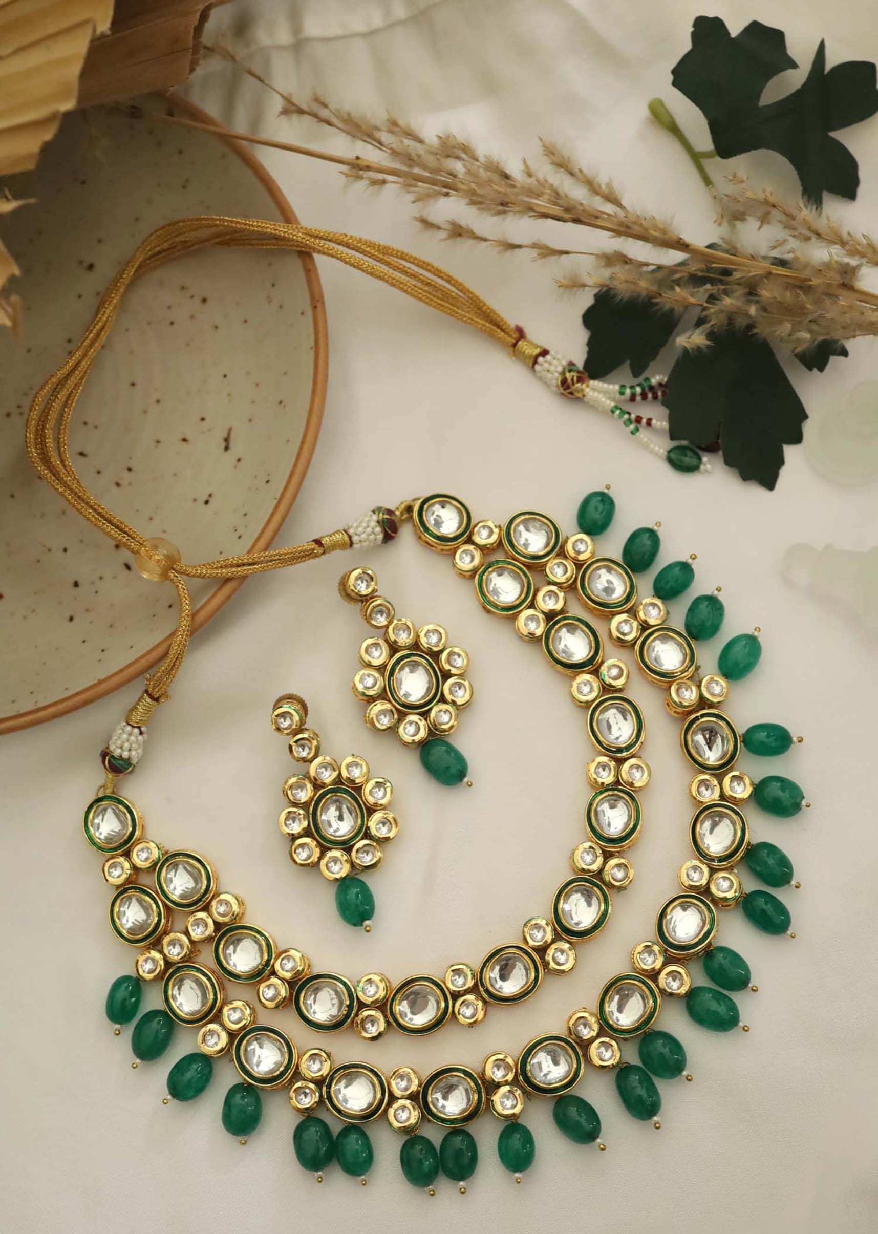 Gold And Green Layered Necklace Set With Kundan Work And Green Stone Drops By Paisley Pop
